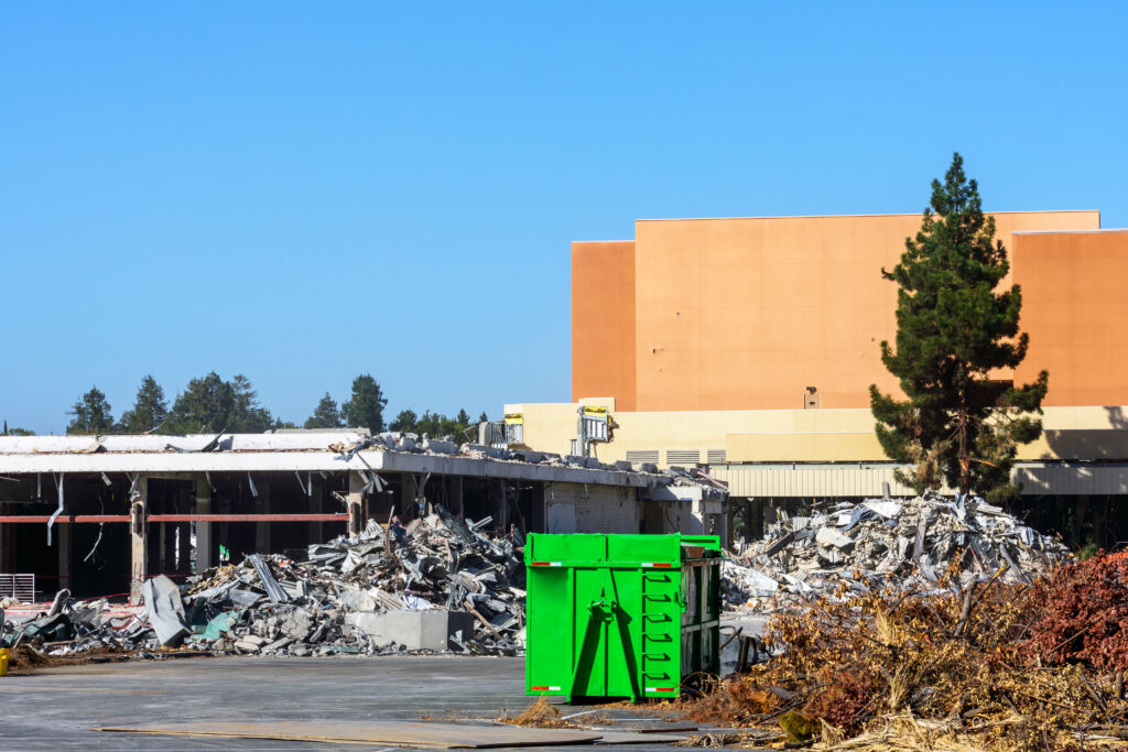 commercial demolition with debris building